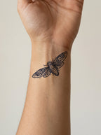 Tatouage Papillon seul appliqué sur poignet