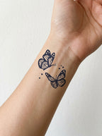 Tatouage Papillons Amoureux appliqué sur poignet