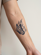 Tatouage Papillon de Feu appliqué sur avant-bras