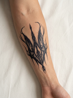 Tatouage Pointe Tribale appliqué sur avant-bras