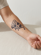 Tatouage Pizza Love appliqué sur avant-bras