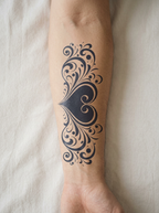 Tatouage Cœur Baroque appliqué sur avant-bras